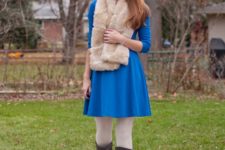 With cobalt blue dress, white tights and gray high boots