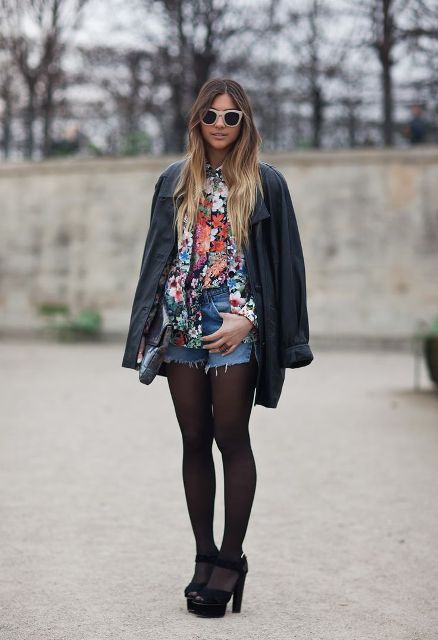 With floral blouse, navy blue coat and black heels