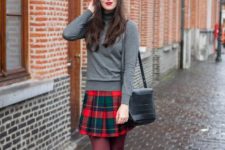 With gray turtleneck, marsala tights, ankle boots, red beret and leather bag