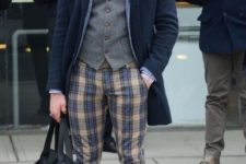With gray vest, shirt, bow tie, navy blue coat, black shoes and tote