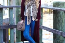 With marsala long cardigan, marsala wide brim hat, jeans, black boots and bag