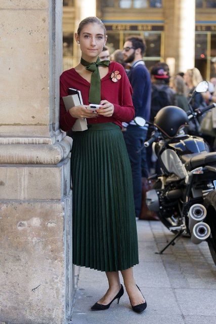 With marsala shirt, green pleated skirt and black shoes