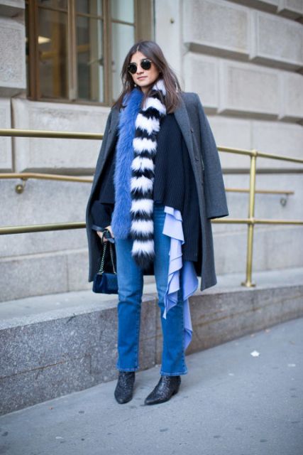 With navy blue shirt, gray coat, jeans and black boots
