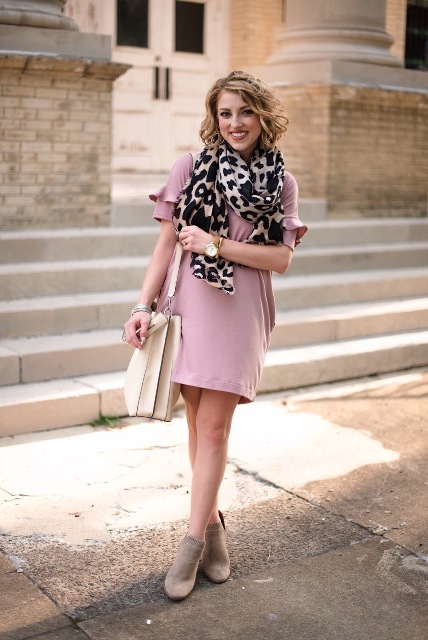 With pale pink dress, gray suede boots and white bag