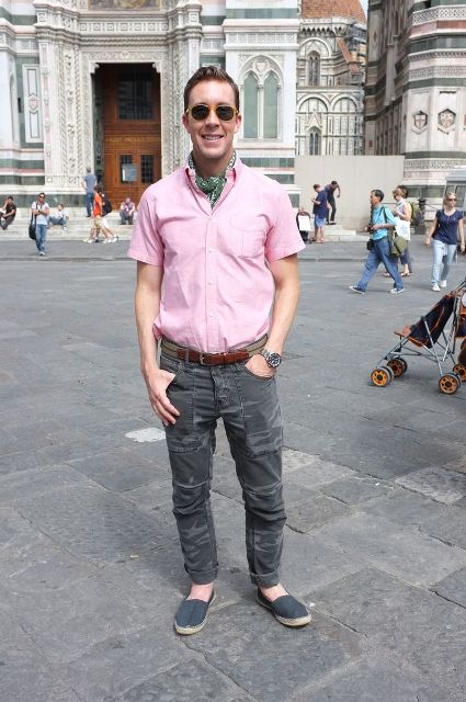 With pale pink shirt, gray pants and gray shoes