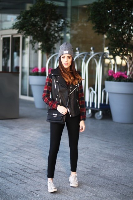 With plaid shirt, gray beanie, black pants, white sneakers and black small bag