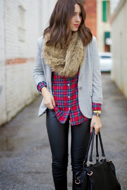 With plaid shirt, gray jacket, leather pants and black bag