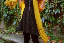 With polka dot dress, black tights, printed shoes and yellow cardigan