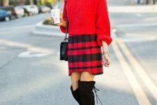 With red sweater, over the knee boots and chain strap bag
