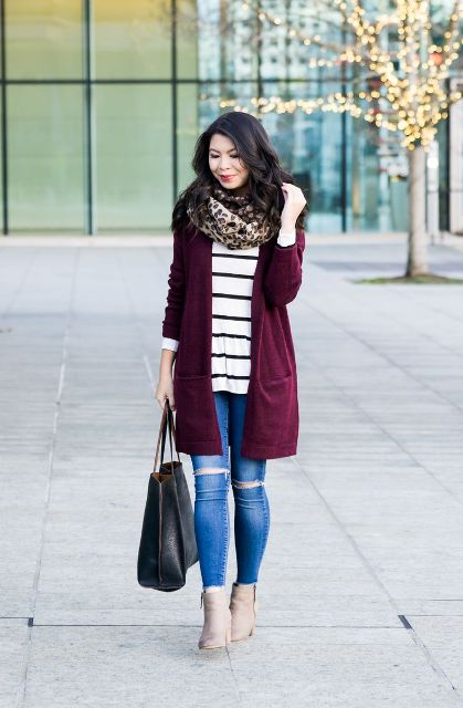 With striped long sweatshirt, marsala cardigan, distressed jeans, beige ankle boots and black tote