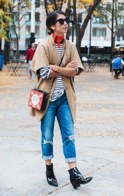 With striped shirt, camel cardigan, cuffed jeans, ankle boots and unique bag
