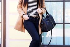With striped shirt, jeans, embellished flats, camel coat and black hat