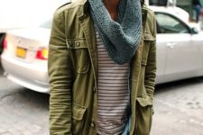 With striped shirt, olive green jacket, pants and big bag