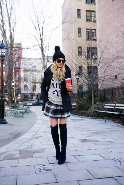 With sweatshirt, over the knee boots, beanie and jacket