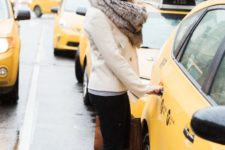 With white beanie, beige jacket, skinny pants and gray pumps