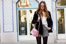 With white blouse, black jacket, light pink bag and ankle boots