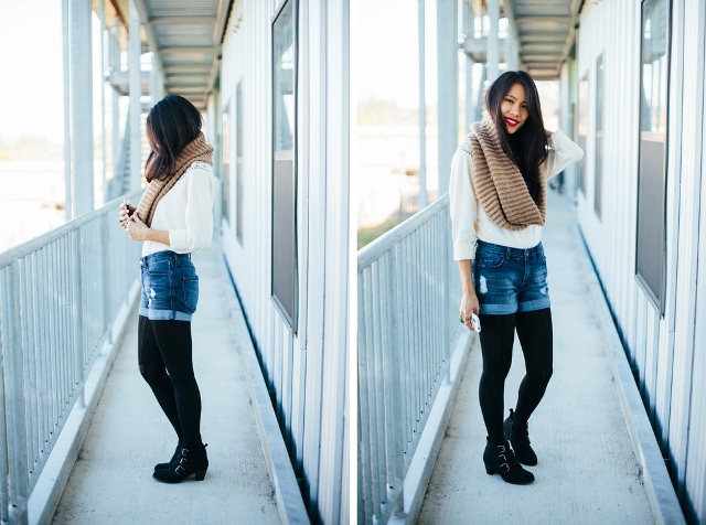 With white blouse, knitted scarf, ankle boots and black tights