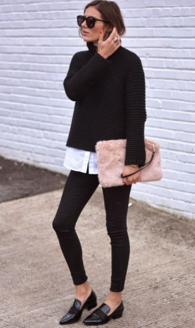 With white button down shirt, black sweater, black skinny pants and black flats