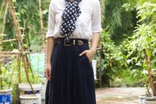 With white shirt, navy blue skirt and black leather belt