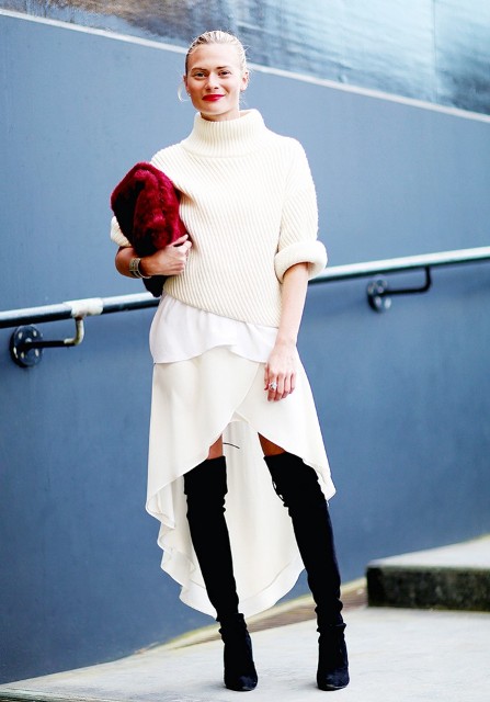 With white turtleneck sweater, white skirt and black suede over the knee boots
