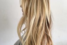 a beautiful and messy blonde balayage with a darker root and waves is a lovely idea for a beach-style look