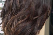 a dark brown wavy bob with caramel highlights is a lovely and chic idea that looks effortless and awesome