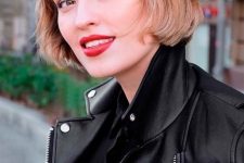 a jaw-length brunette bob with blonde balayage and waves plus bangs is a catchy idea, which looks effortless