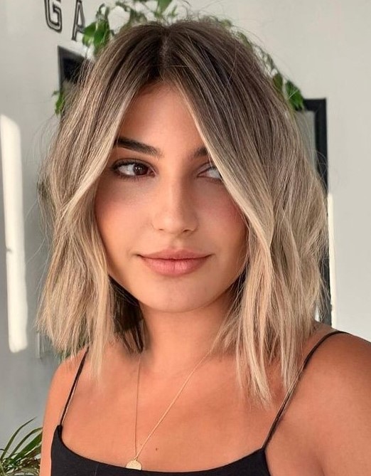 a long bob with darker root and blonde balayage plus messy waves is a beautiful idea to rock any time