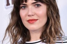 a long dark brunette bob with bronde balayage, bottleneck bangs and waves is a chic and French-inspired idea