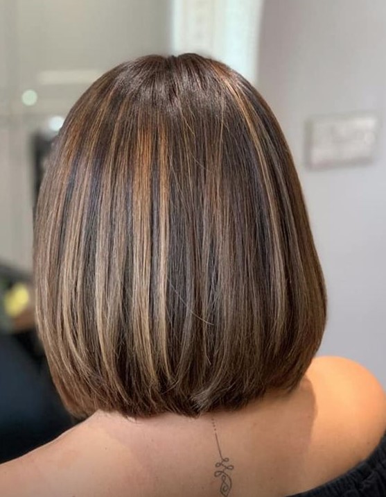 a stylish dark brunette long bob with caramel highlights is a catchy and lovely idea for a modern and fresh look