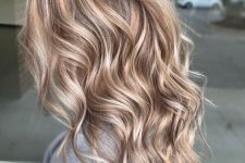 long hair with lovely bleached blonde balayage, shadow root and waves looks adorable, it catches an eye