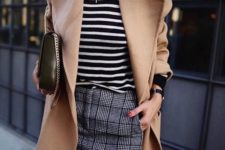 02 a checked mini skirt, a black and white striped top, a camel coat and a black bag