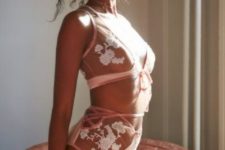 02 pink and white lace lingerie set with bows and sheer detailing and lacing