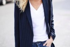 06 ripped jeans, a white tee, a navy striped long blazer and a black bag for a casual work look