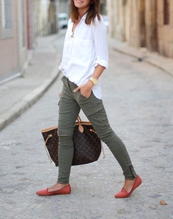 a white shirt, olive green pants, red flats and a printed bag
