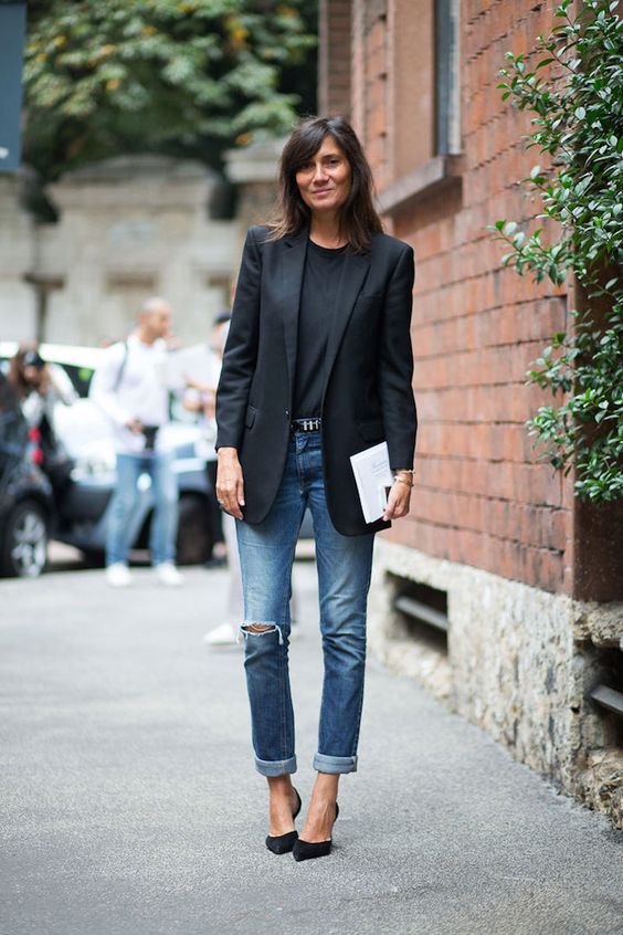 blue ripped boyfriend jeans, black heels, a black top and a black long blazer for a business casual look