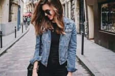 13 sleek black jeans, a black tee, a cropped blue denim jacket