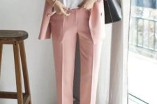 14 a casual pantsuit look with a white top and sneakers