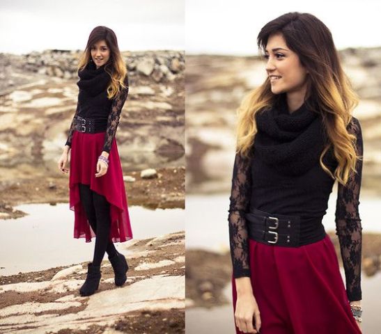 With black lace shirt, belt and ankle boots