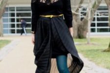 With black lace shirt, yellow belt, colored tights and ankle boots