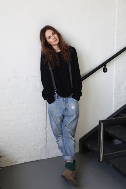 With black oversized sweater and suede boots