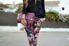 With black shirt, pumps and purple clutch
