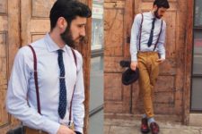 With classic button down shirt, brown pants, blue socks and marsala shoes
