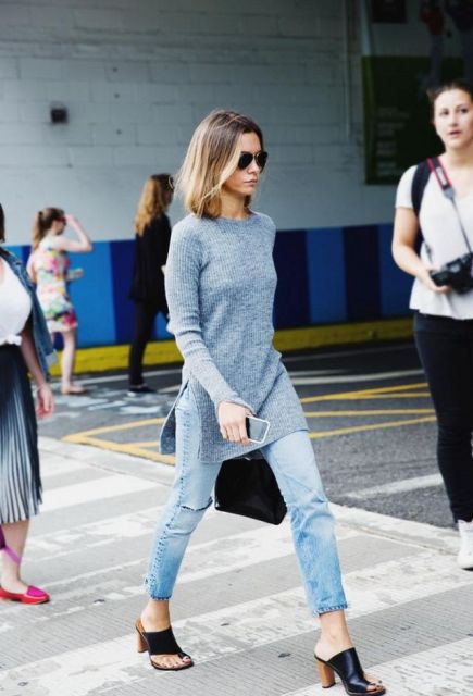 With crop jeans, mules and black bag