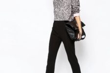 With gray sweatshirt, black mules and leather bag