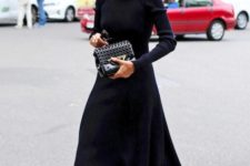With midi dress and clutch