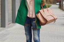 With pastel colored shirt, green jacket, cuffed jeans and beige bag