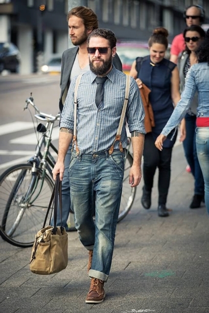 With striped shirt, cuffed jeans, tie, bag and brown boots