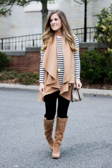 With striped shirt, leggings, brown suede boots and gray bag