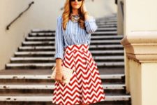 With striped shirt, red shoes and clutch